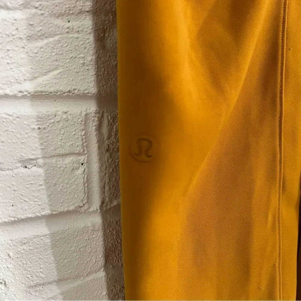 Lululemon On the Fly 7/8 Pant *Woven Fools Gold Size 4